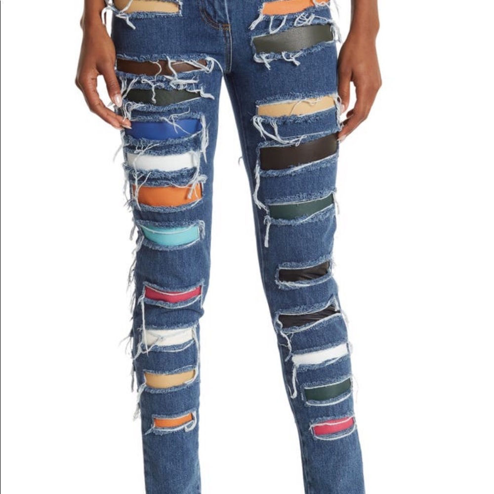 Blue jeans with colorful leather patches